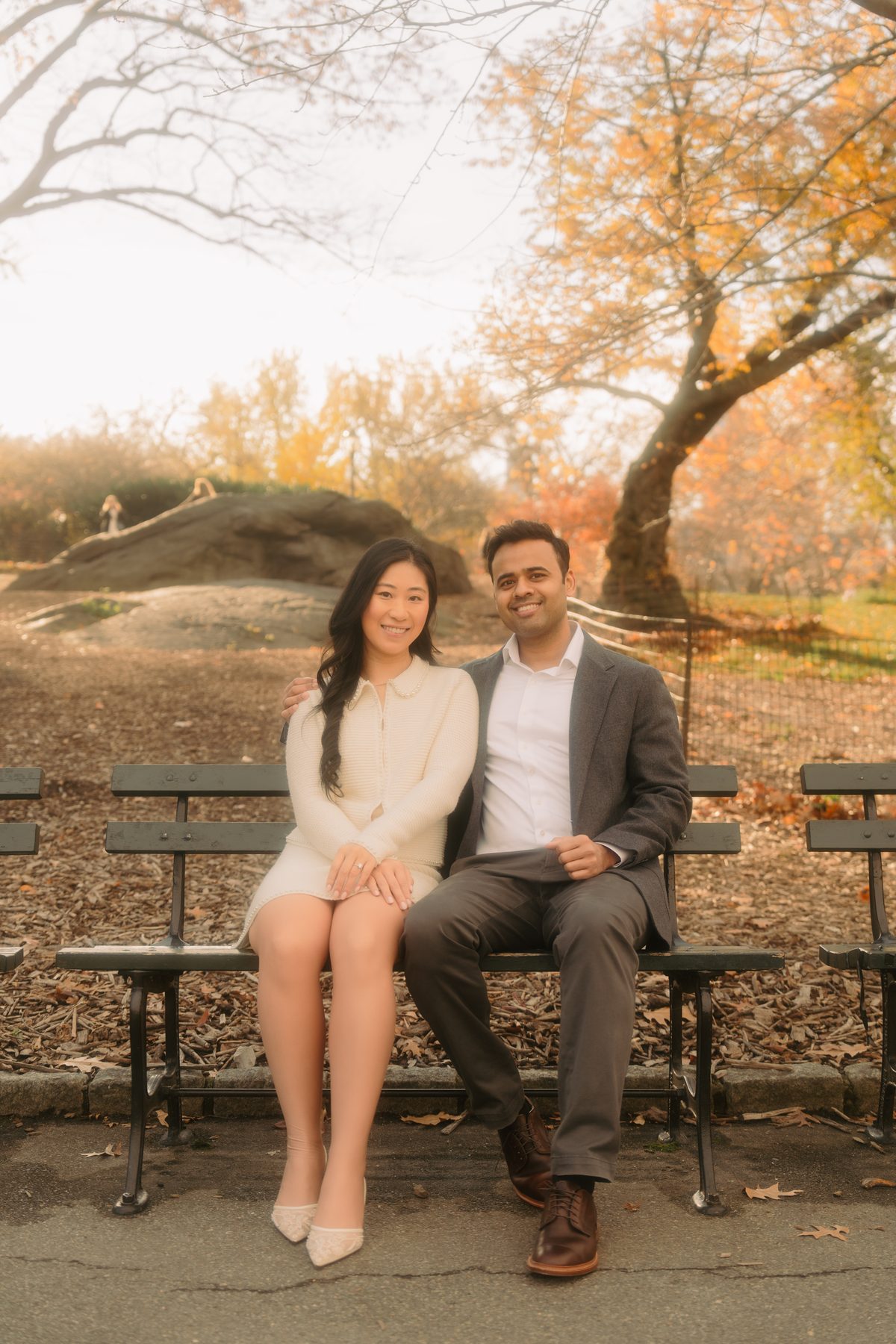 Bernice and Mayank on a park bench